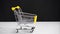 Concept of the shopping cart sale movement. Stop motion