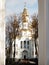 Concept. Snow-white temple with gilded domes.