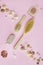 Concept of Spa-cosmetic and cosmetic procedures. Spa-sea salt, wooden comb, anti-cellulite massage brush on a pink background. The