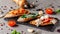Concept of Spanish cuisine. Tapas Different bruschetta on a fried baguette with basil, tomatoes, cheese. Serving dishes