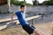 Concept of sports and health - teen boy training and pushups at the stadium. Physical exercise. Workout, fitness and health care