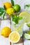 Concept of summer refreshing healthy alcohol free homemade lemonade with fresh pepper mint, limes and lemons. Low calories cold