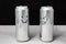 Concept of talking friends. Smile and laugh emoji. dialog of two aluminium cans on black background. Emotions