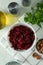 Concept of tasty eating with bowl of beet salad on white textured table