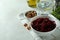 Concept of tasty eating with bowl of beet salad on white textured table