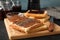 Concept of toasts with choco cream on wooden board