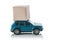 Concept of a transport delivery service. Car with a box on the roof, isolated on a white background