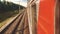 Concept travel train wagon journey. View through the train window of the wagons in the composition passing nature