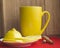 Concept of treating colds - hot tea with lemon, scarf