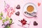 Concept Valentine`s Day. Chocolate candies and coffee, hearts on a pink background. Flat lay copy space. Greeting card and gift
