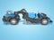 Concept wheeled tractor scraper side view 3d render on blue background with shadow