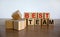 Concept words `best team` on wooden cubes on a beautiful wooden table, white background. Business concept, copy space