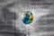 The concept of the world press. focus is the layout of the planet Earth on the background of a defocused blurred newspaper. The