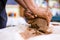 Concepts of Ceramist in Workshop. Closeup of Working Hands