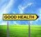 Conceptual arrow sign against beautiful landscape with text - GOOD HEALTH