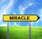 Conceptual arrow sign against beautiful landscape with text - MIRACLE