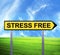 Conceptual arrow sign against beautiful landscape with text - STRESS FREE