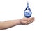 Conceptual blue water drop falling in hands isolated