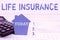 Conceptual caption Life Insurance. Business idea Payment of death benefit or injury Burial or medical claim Selling Land