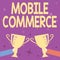 Conceptual caption Mobile Commerce. Word for Using mobile phone to conduct commercial transactions online Abstract