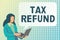 Conceptual caption Tax Refund. Business concept refund on tax when the tax liability is less than the tax paid Studying