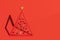 Conceptual Christmas tree on red background with copy space