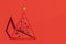 Conceptual Christmas tree on red background with copy space