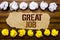 Conceptual hand text word Great Job. Business concept for Success Appreciation Written on sticky note, wooden with sticky, many fo