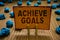 Conceptual hand writing showing Achieve Goals. Business photo text Results oriented Reach Target Effective Planning Succeed Clothe