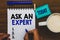 Conceptual hand writing showing Ask An Expert. Business photo text Superior Reliable Ace Virtuoso Curiosity Authority Geek Man hol