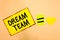 Conceptual hand writing showing Dream Team. Business photo text Prefered unit or group that make the best out of a person Yellow p