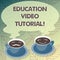 Conceptual hand writing showing Education Video Tutorial. Business photo text method of transferring knowledge through video Cup