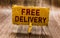 Conceptual hand writing showing Free Delivery. Business photo text Shipping Package Cargo Courier Distribution Center Fragile Pape