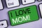 Conceptual hand writing showing I Love Mom Motivational Call. Business photos text Good feelings for their own mother Tenderness