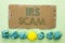 Conceptual hand writing showing Irs Scam. Business photo text Warning Scam Fraud Tax Pishing Spam Money Revenue Alert Scheme writt