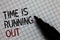 Conceptual hand writing showing Time Is Running Out. Business photo text Deadline is approaching Urgency things cannot wait Black