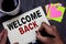 Conceptual hand writing showing Welcome Back. Business photo text Warm Greetings Arrived Repeat Gladly Accepted Pleased Man holdin