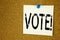 Conceptual hand writing text caption inspiration showing Vote. Business concept for Voting Electoral Vote written on sticky note,