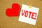 Conceptual hand writing text caption inspiration showing Vote concept for Voting Electoral Vote and Love written on sticky note, r