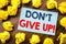 Conceptual hand writing text inspiration showing Don t Give Up. Business concept for Motivation Determination, written on sticky n