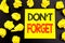 Conceptual hand writing text showing Do Not Forget. Business concept for Don t memory Remider written on sticky note paper. Folded