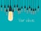 Conceptual idea of light bulbs hang on lite blue color background.