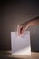 Conceptual image of a person voting during elections