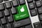 Conceptual keyboard - Be vegan green key with apple symbol