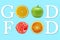 A conceptual message made up of the letters and fruits of lemon, orange, green apple and raspberry shows `good food`.