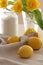 Conceptual photo in Kitchen. Yellow lemons, sugar and yellow tulips on the table. Conceptual photo. Interior Photos