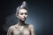 Conceptual portrait of beautiful naked shoulders vanguard hairstyle metallic colour hair girl wearing steel construction armature