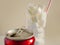 Conceptual still life image of glass with straw full sugar cubes and soda refresh drink in unhealthy nutrition sugar addiction an