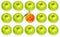 Conceptual view of allergic and hypoallergic fruits; green apples and smilling orange tangerine