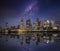 Conceptual view of a modern, illuminated city skyline during night time